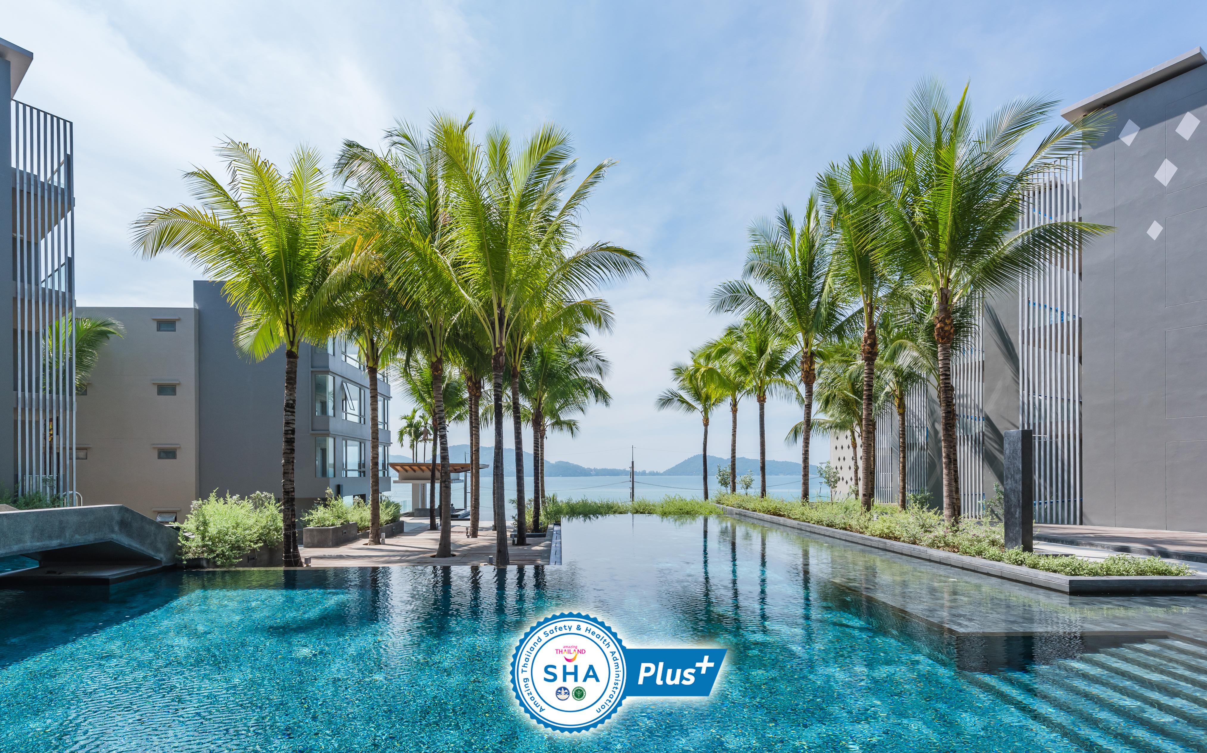 Oceanfront Beach Resort - Sha Extra Plus Patong Exterior foto The SHA Plus logo